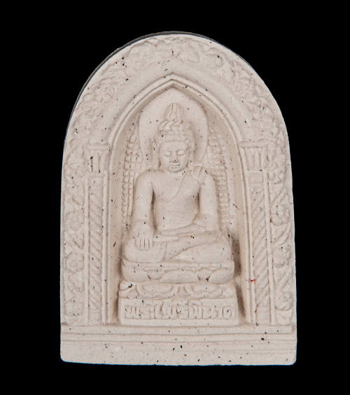 Thai Buddhist amulet with Phra Pairee Pinnat Buddha image in bhumisparsha mudra (touching the earth posture)