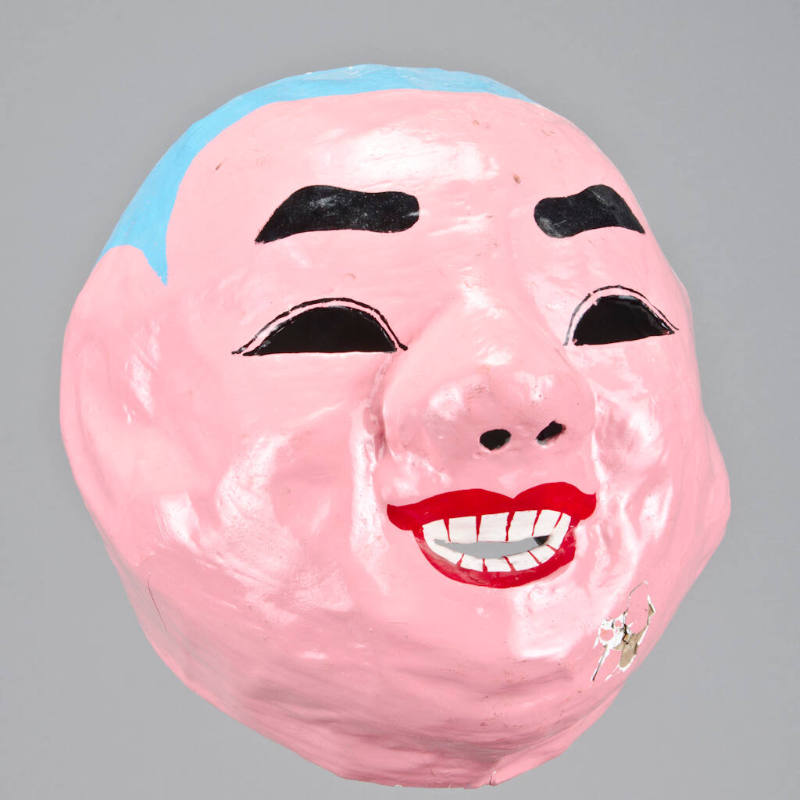 Smiling man dance mask