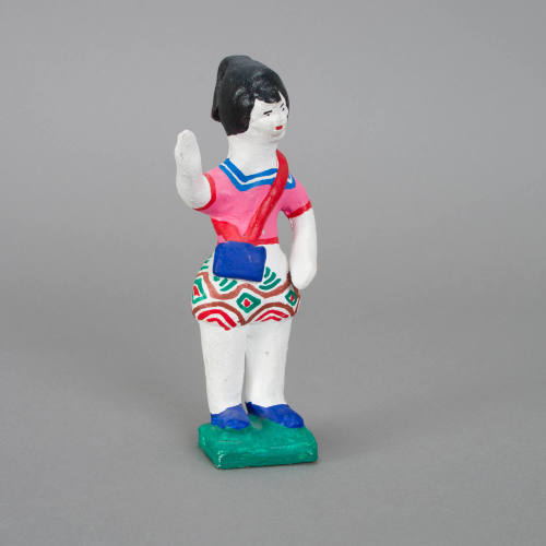 Figure, woman with arm raised and purse