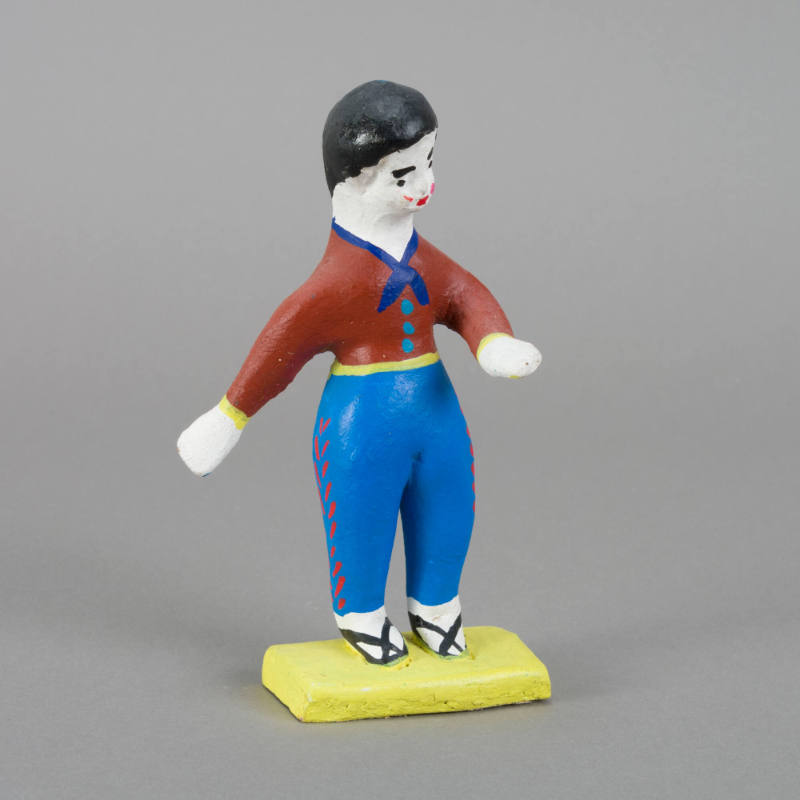 Figure, man with arm exteded forward