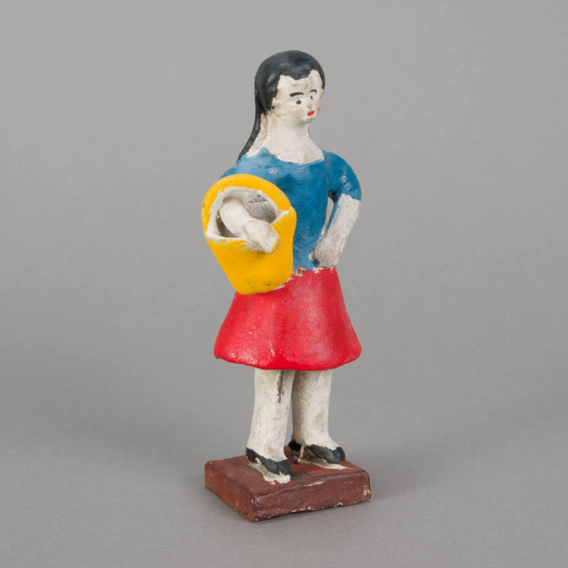 Figure, woman with basket over arm