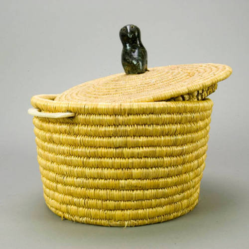 Coiled grass basket with soapstone finial and bone handles