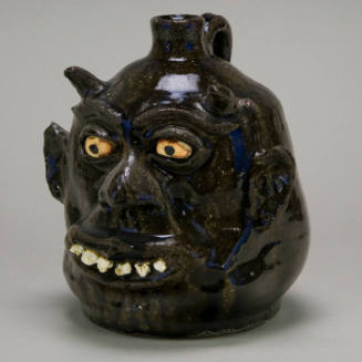 Devil face jug