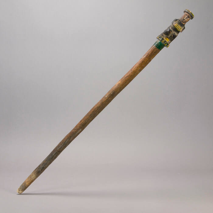 Staff, male figure