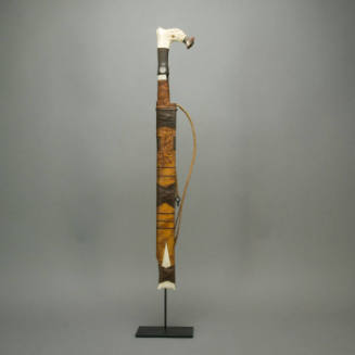 Sword with carved wood sheath